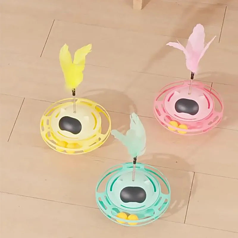 Pink self-moving cat toy with turntable base measuring 17cm by 10cm