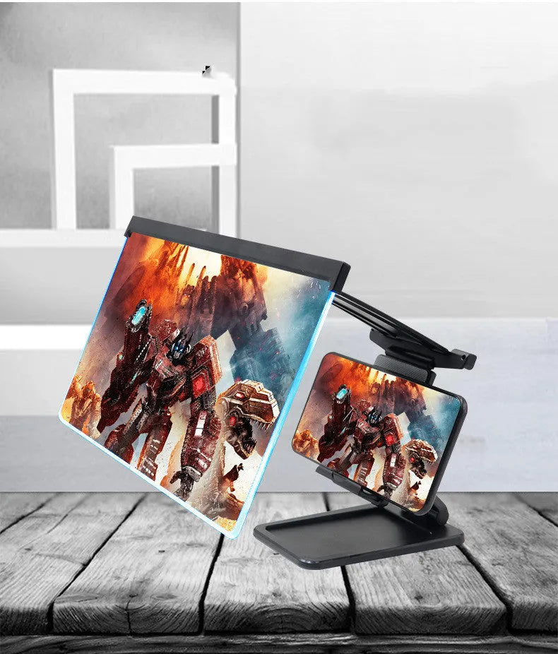 Black folding mobile phone screen amplifier with detachable holder showing 3-4x magnification
