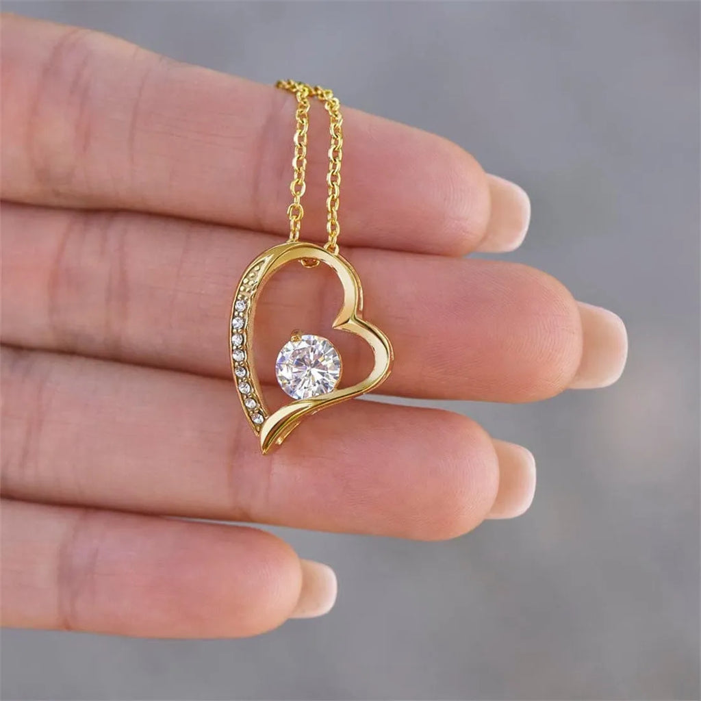 Hollow heart necklace pendant in silver tone with European-American styling and gift packaging