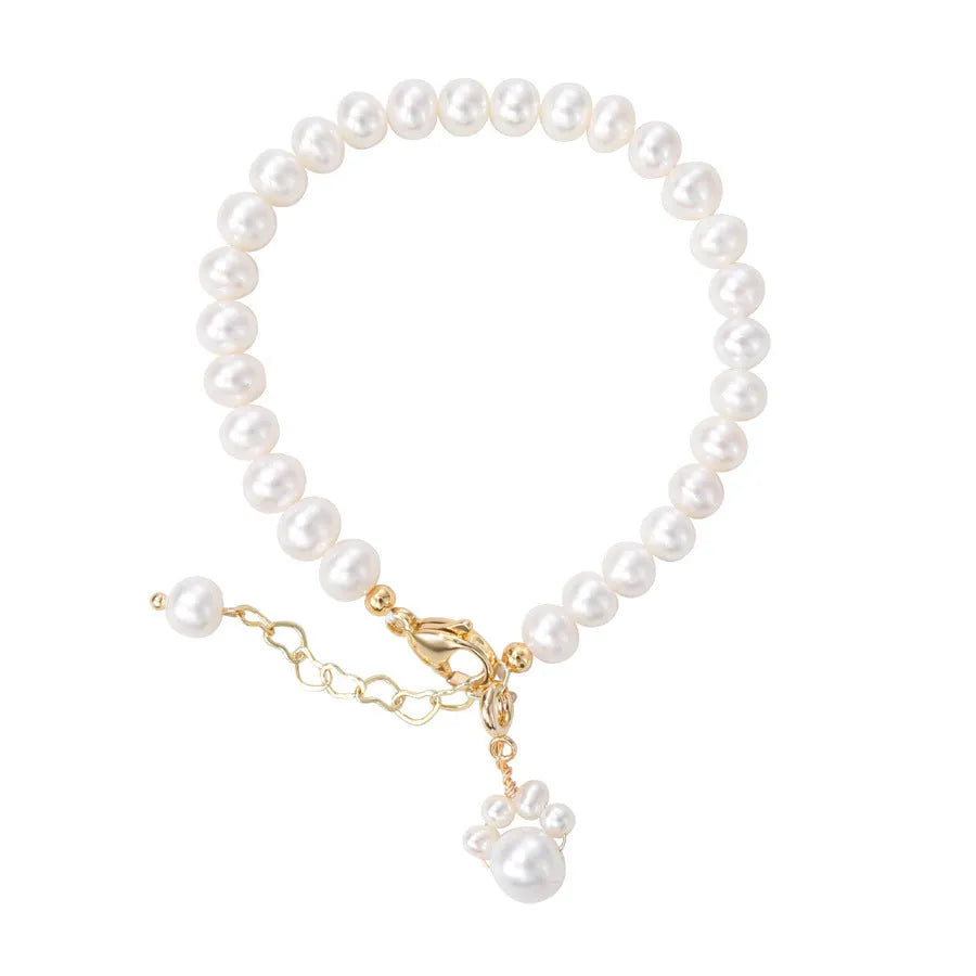 White freshwater pearl cat paw bracelet with electroplated finish for women
