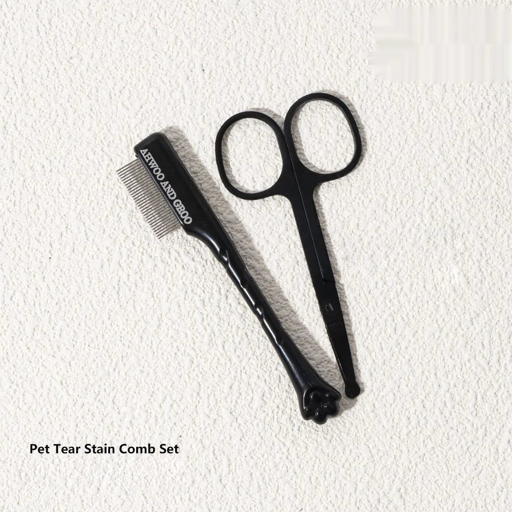 Black ABS plastic pet tear stain comb and scissors set on white background