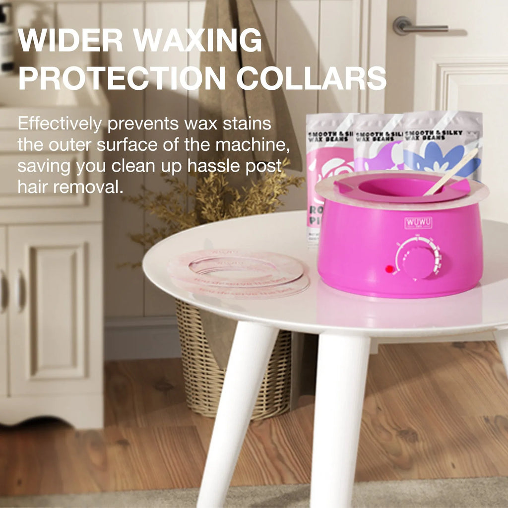 Professional waxing kit with wax warmer, pots of coloured wax beans, application sticks, lotion, and cooling masks on a pink background.