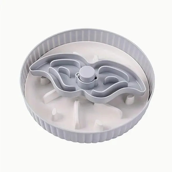 Pet slow feeder bowl with rotating game board and removable silicone licking mat in blue.