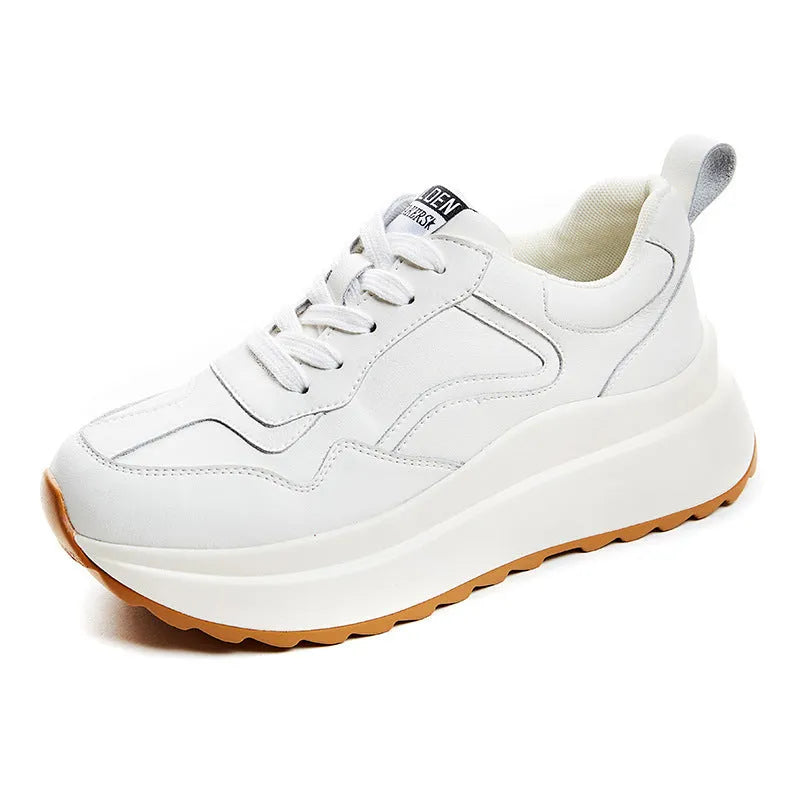 Beige women's low-top leather casual sports shoes with lace-up fastening and round toe.