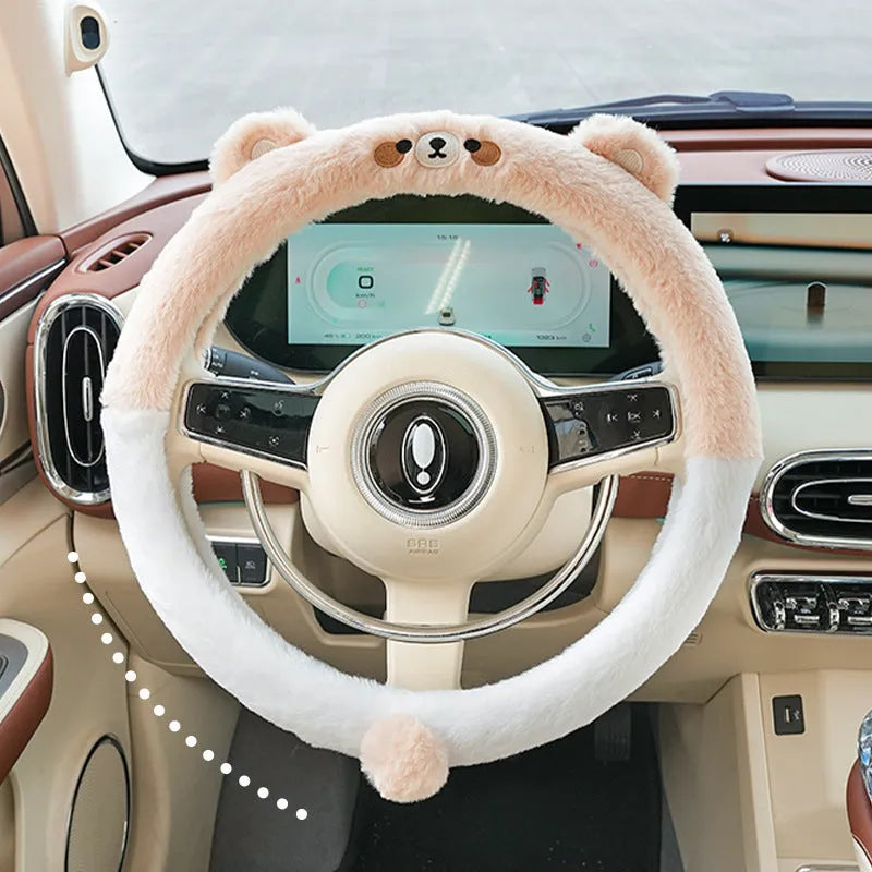 Plush winter steering wheel cover with cartoon embroidery, shown in 38cm size on a car steering wheel.
