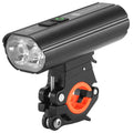 Black rechargeable bicycle light 1800 lumens with aluminium alloy body and POM bracket mounted on a handlebar