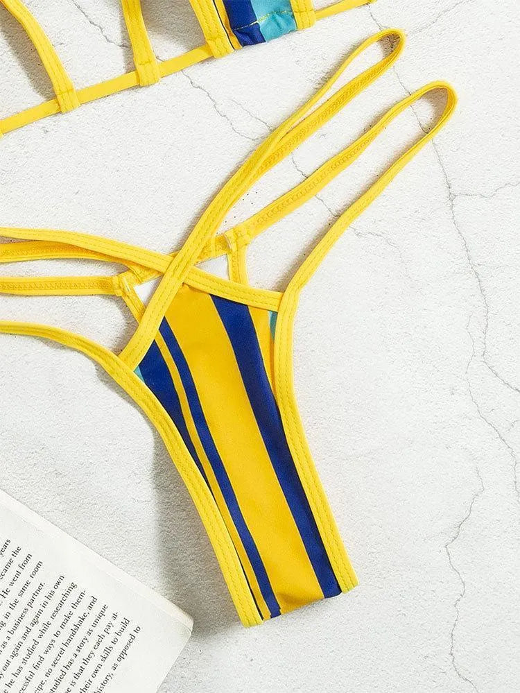 Yellow women's high-waist hollow-out backless swimsuit bikini set on a neutral background.