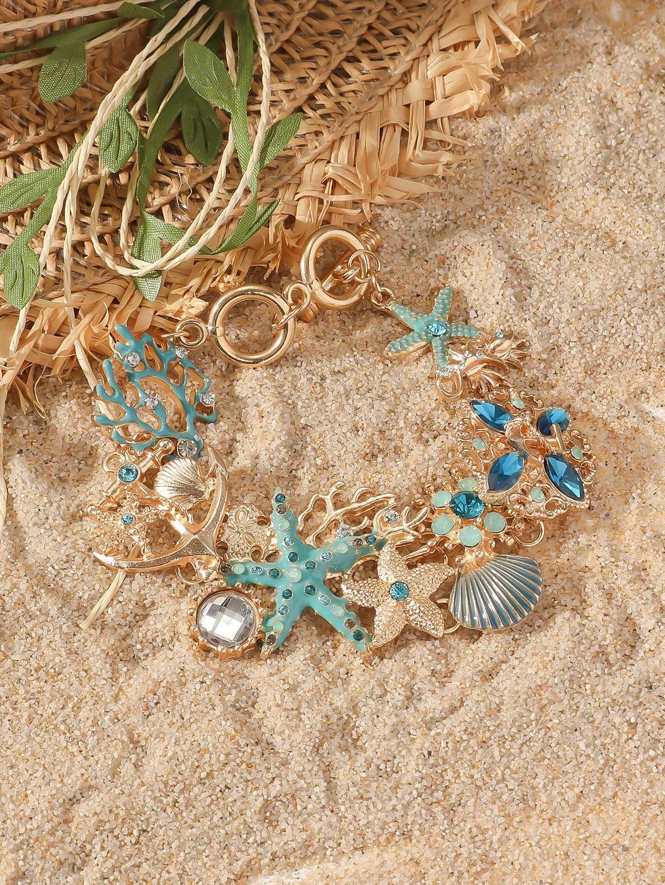 Women's alloy rhinestone marine bracelet with boat anchor and shell design in coastal colours