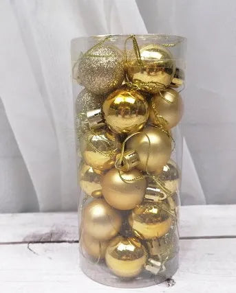 Assorted metallic gold, red, silver, and blue 3cm plastic Christmas bauble ornaments in a box.