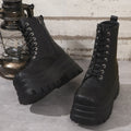 Women's white retro platform ankle boots with chunky heel and side zipper, showing round toe patchwork detail.