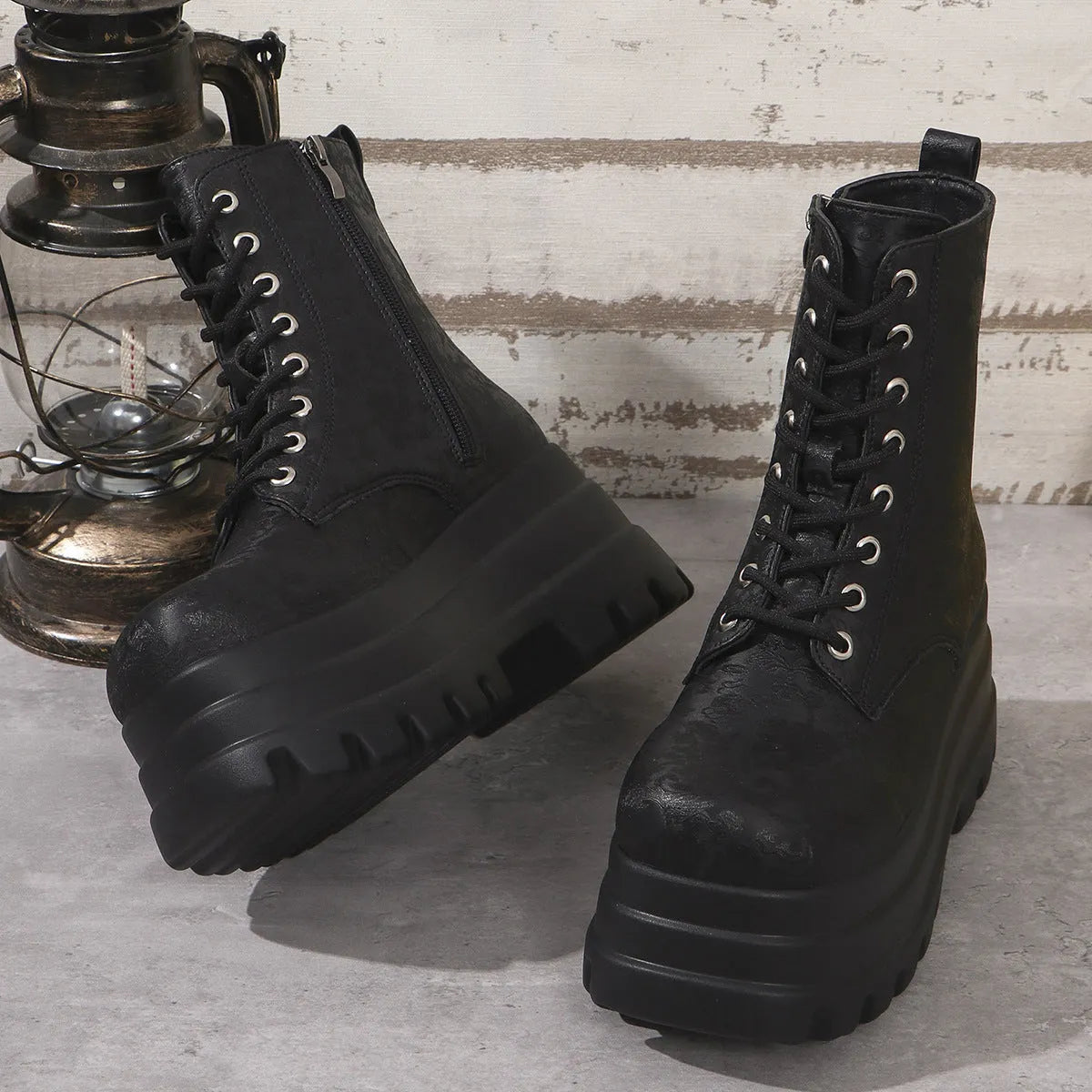 Women's white retro platform ankle boots with chunky heel and side zipper, showing round toe patchwork detail.