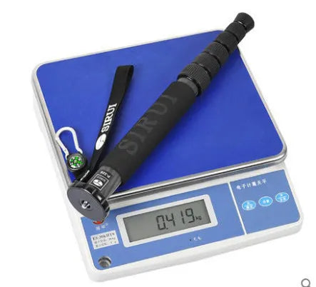 Black carbon fibre SLR camera monopod with six sections extended to maximum 1540mm height