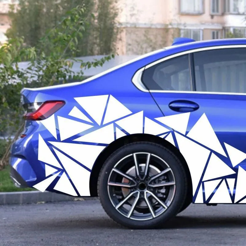 Large black geometric vinyl car sticker sheet for wheel arch decoration, measuring 200cm by 60cm.