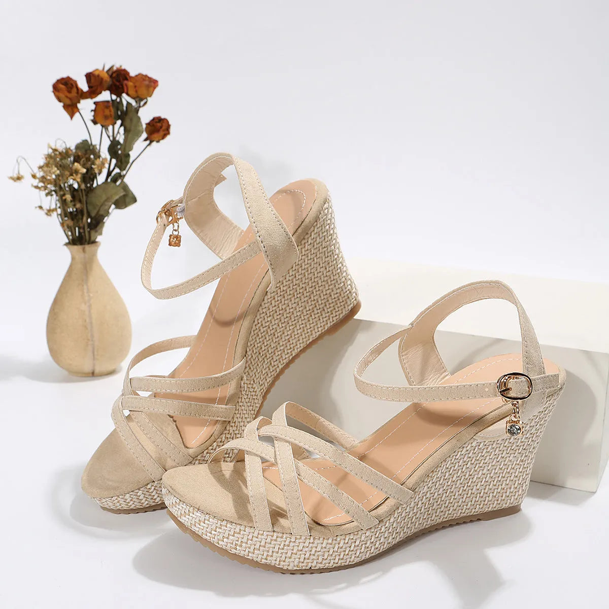 Women's beige wedge sandals with fabric uppers and fish-mouth toe design