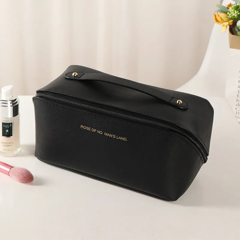 Korean style PVC waterproof pillow cosmetic bag in milky white with letter print pattern