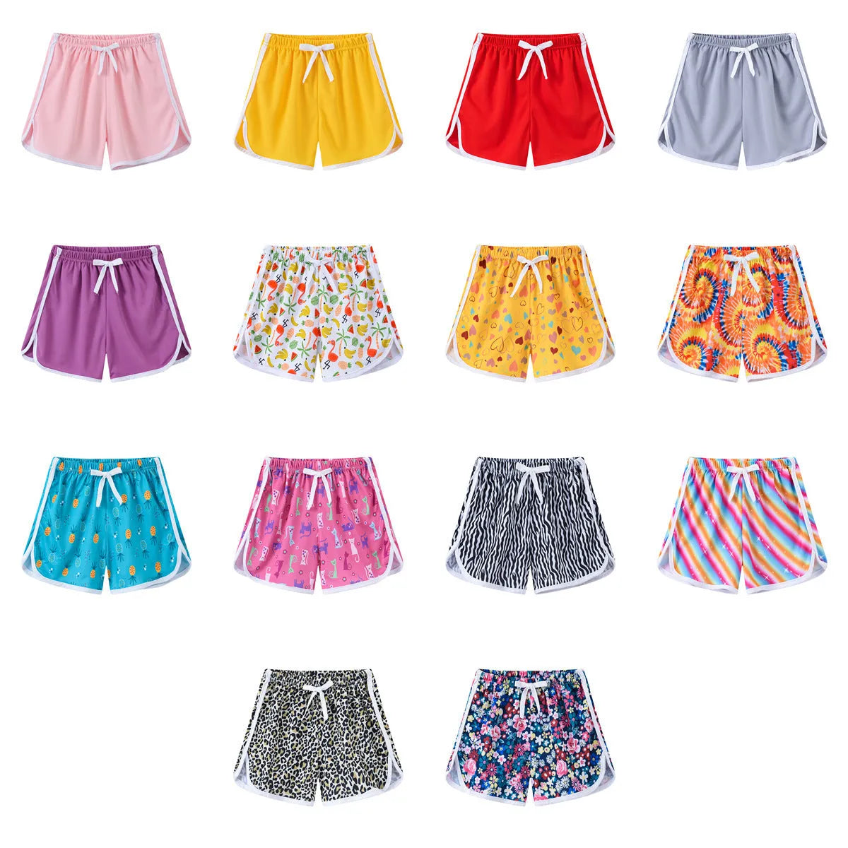 Children's casual polyester shorts in assorted colours and prints like pineapple, kitten, and stripes for beach wear.