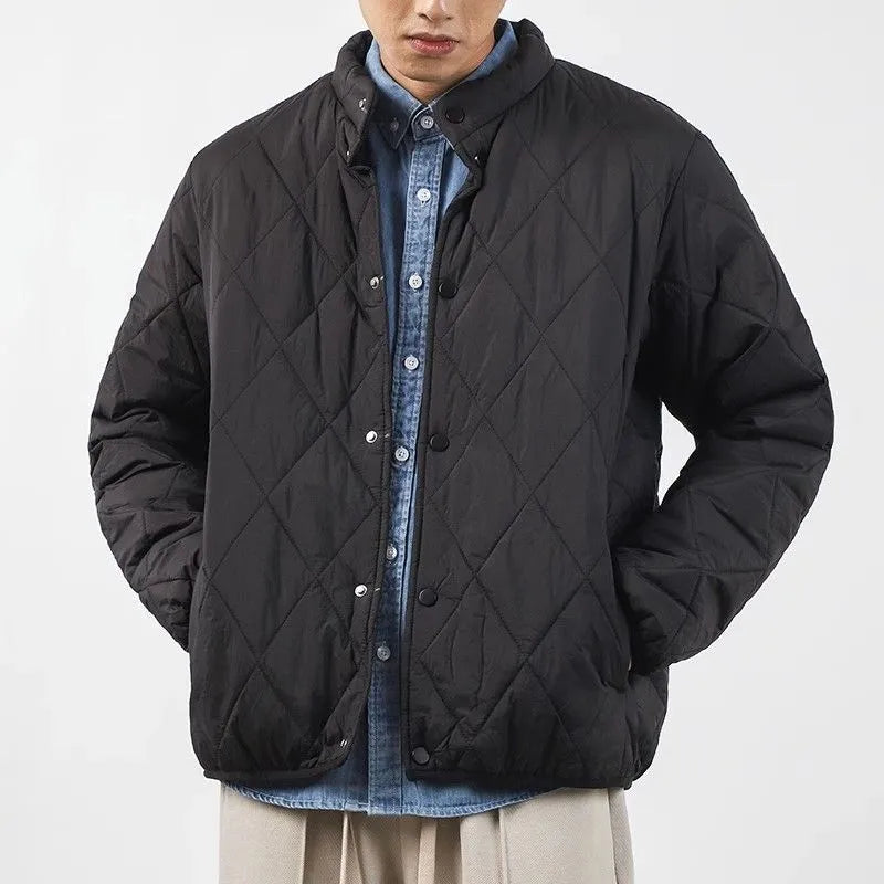 Men's black diamond lattice patterned winter jacket with lengthened cut and padded construction