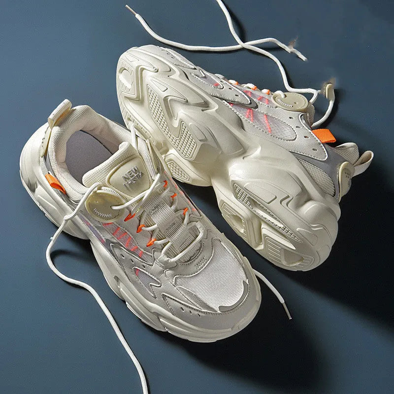Men's PU running sports shoes in beige with stitching detail, side view