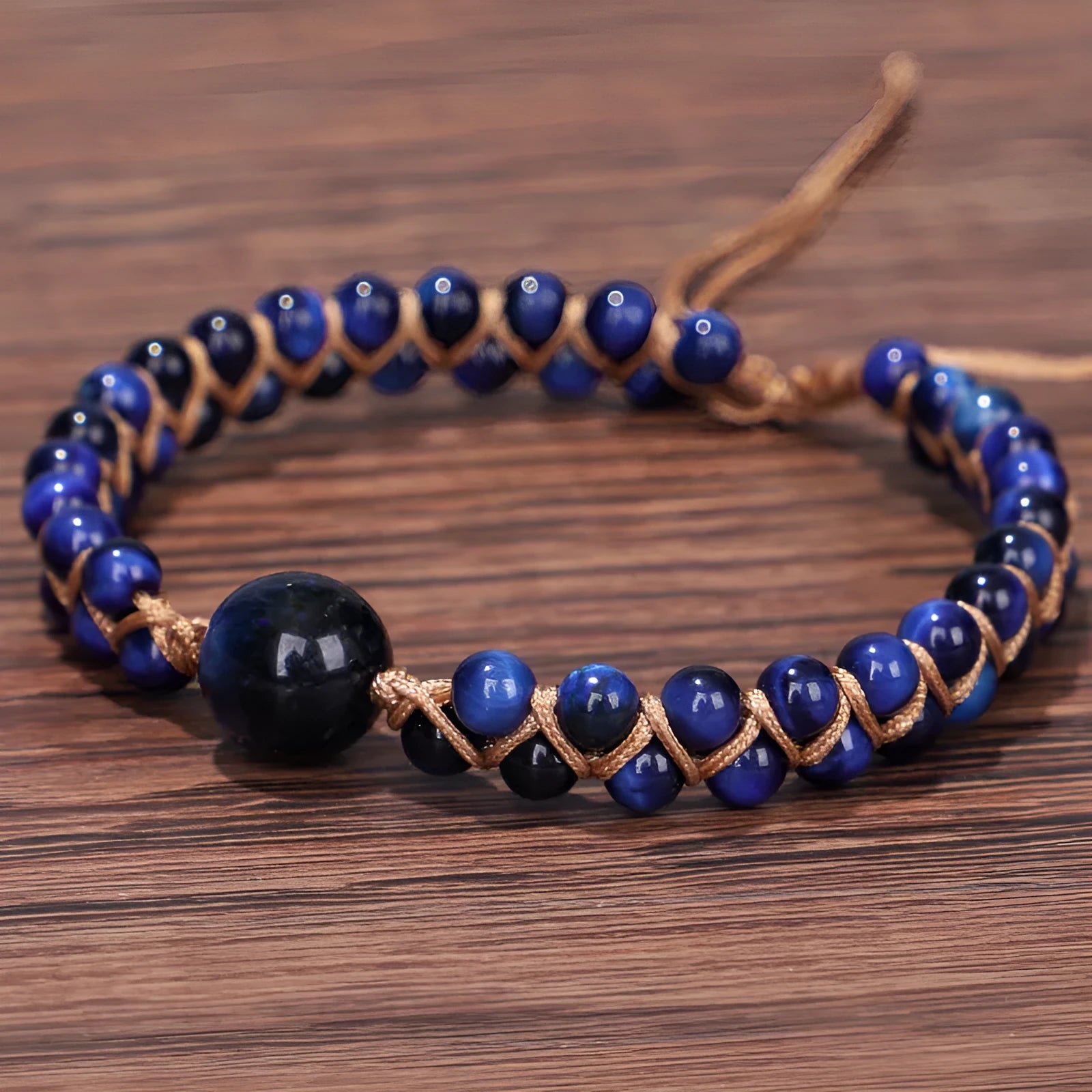 Handmade woven geometric pull bracelet with stone beads in blue tigereye or amethyst colours