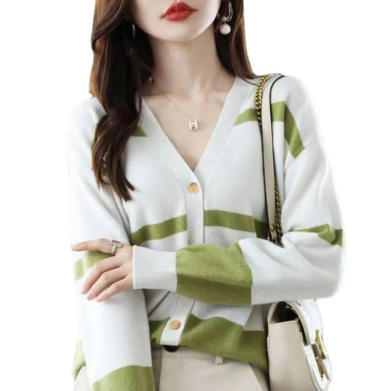 Women's slim fit V-neck cardigan with 3D striped pattern in black and white.