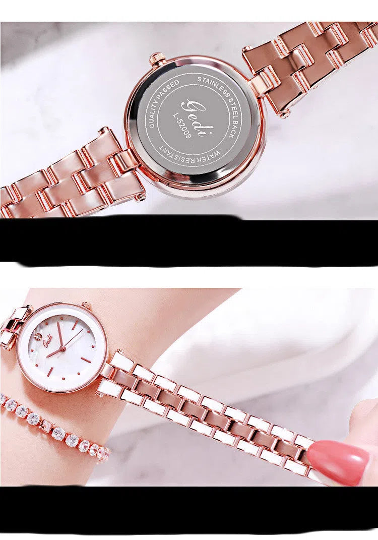 Ladies quartz watch with white round dial, steel strap, and rose gold sheen on a plain background