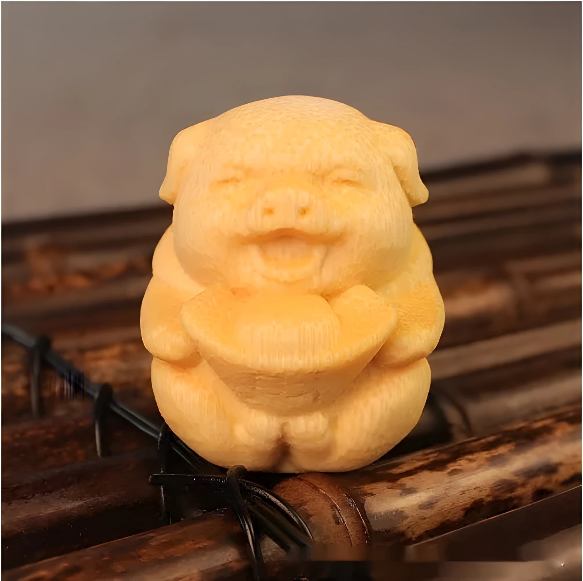 Solid bamboo carving ornament showing ingot pig design with 4cm height