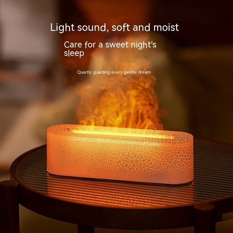 Square-shaped lava lamp-style USB aroma diffuser humidifier with colourful flame light effect on a desk.