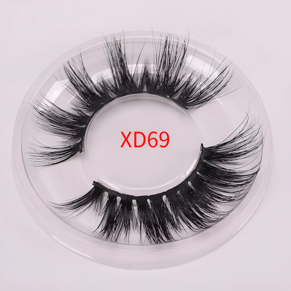 5D mink false eyelashes set with brush and hair cap on black background