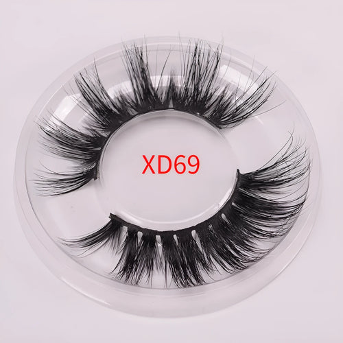 5D mink false eyelashes set with brush and hair cap on black background