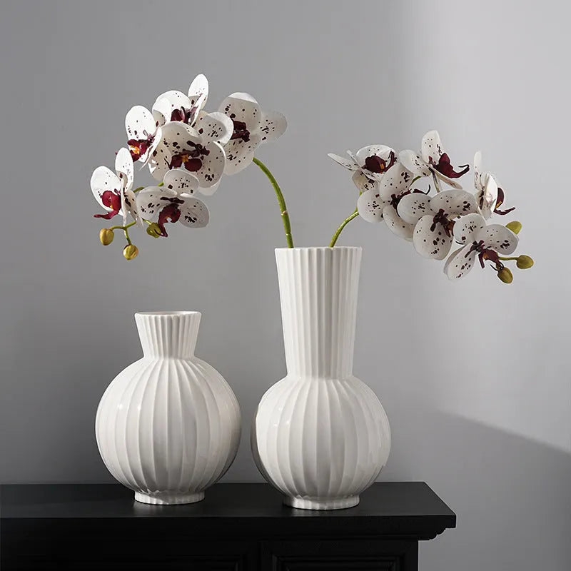 White American country style ball striped ceramic vase with orchid arrangement