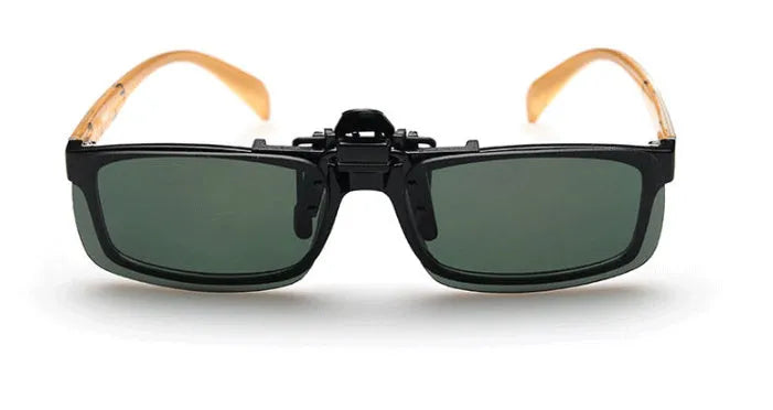 A clip-on sunglasses accessory with PC lenses shown in dark green, grey, and night vision tints, designed to fit over prescription glasses.
