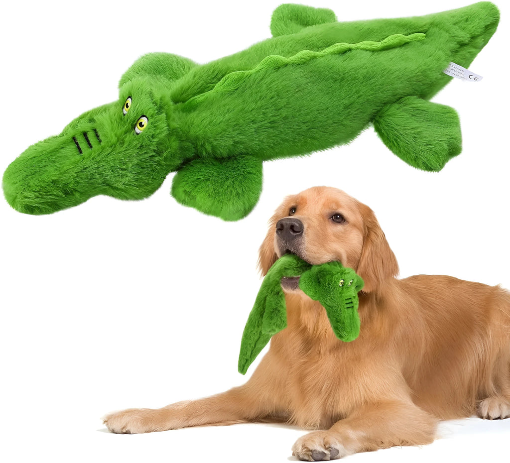 Green crocodile-shaped plush dog toy with squeaker in head and crinkle paper tail