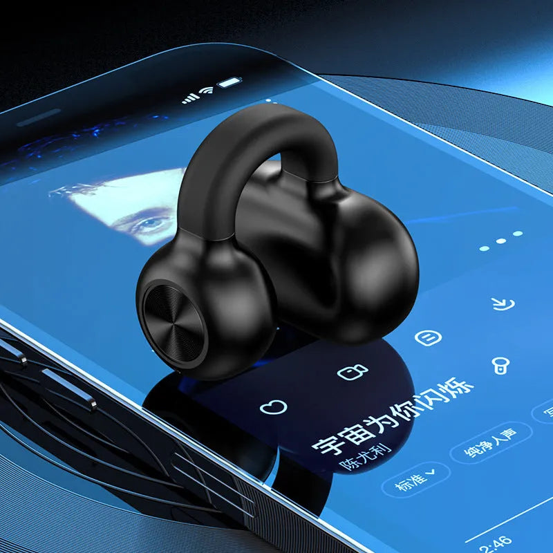 Black wireless Bluetooth clip-on headset with bone conduction technology on a white background.