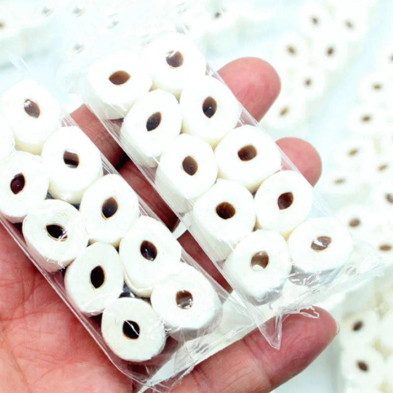 Paper simulated tissue roll model measuring 30mm wide 15mm deep 80mm tall