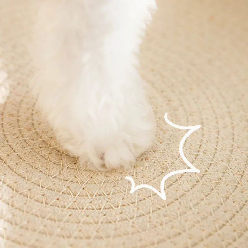 Green oval cat scratching pad with sisal surface measuring 65cm long, functioning as both scratcher and lounger bed