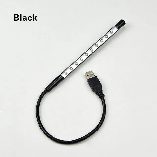 Spiral-shaped aluminium USB desk lamp in metallic colour, showing its 420mm height and push-button switch.