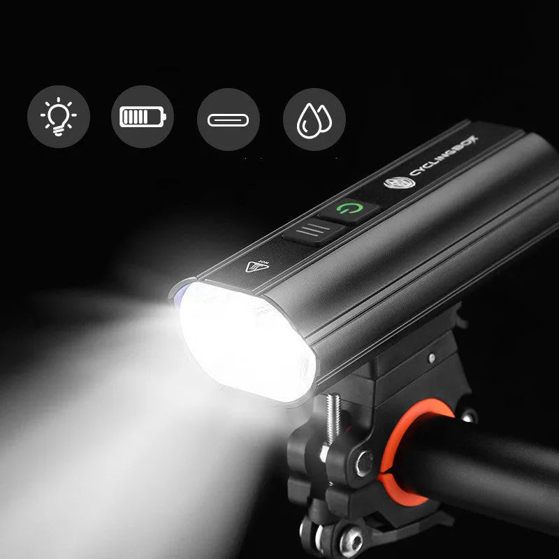 Black rechargeable bicycle light 1800 lumens with aluminium alloy body and POM bracket mounted on a handlebar