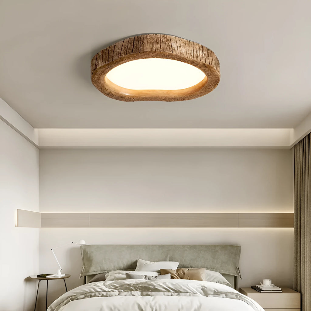 Round New Chinese style ceiling lamp with a wood grain finish, shown in a bedroom setting.