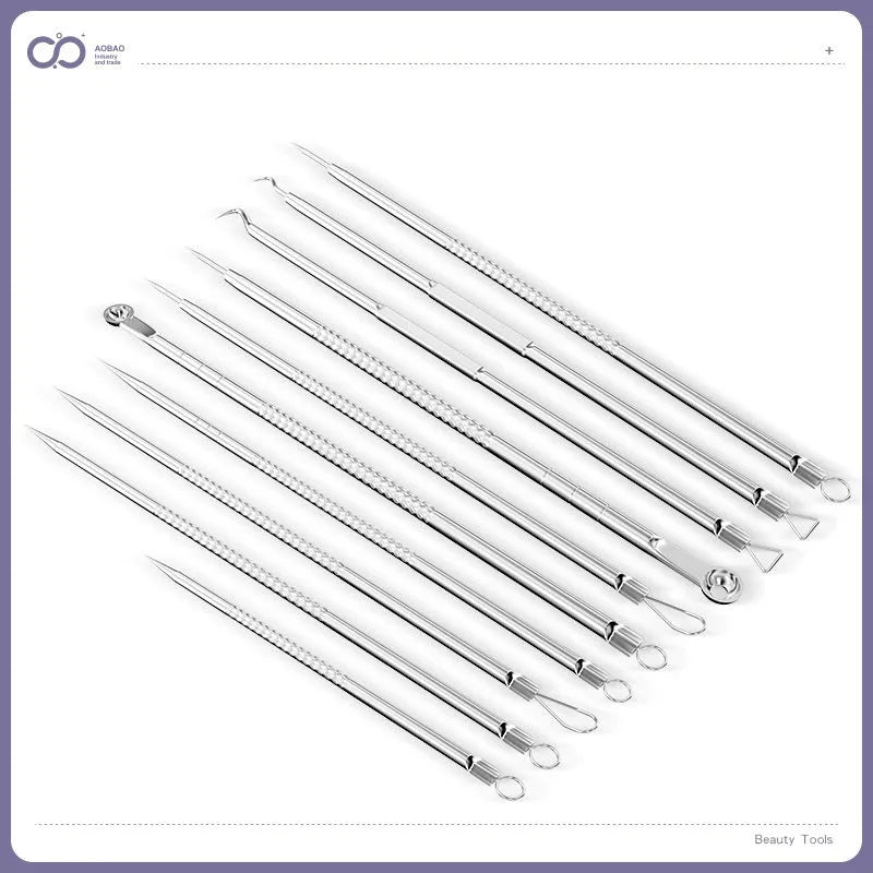 Four silver metal acne needles with ultra-fine pointed tips for skincare extraction.