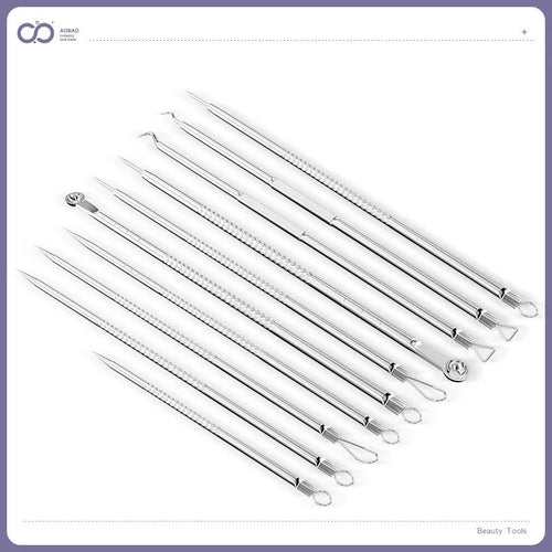 Four silver metal acne needles with ultra-fine pointed tips for skincare extraction.
