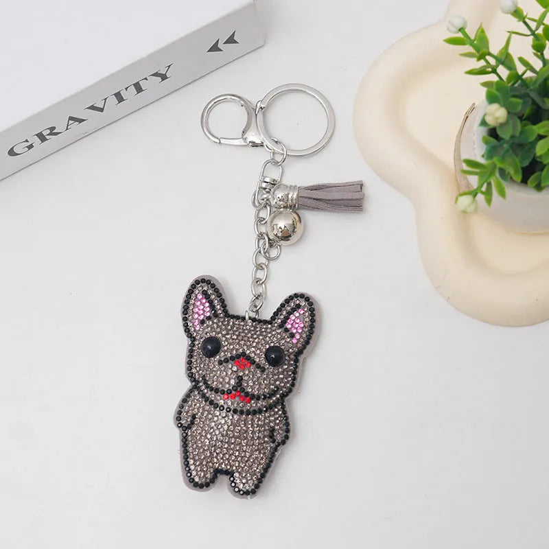 Colourful cartoon animal rhinestone keychain on a metal ring.
