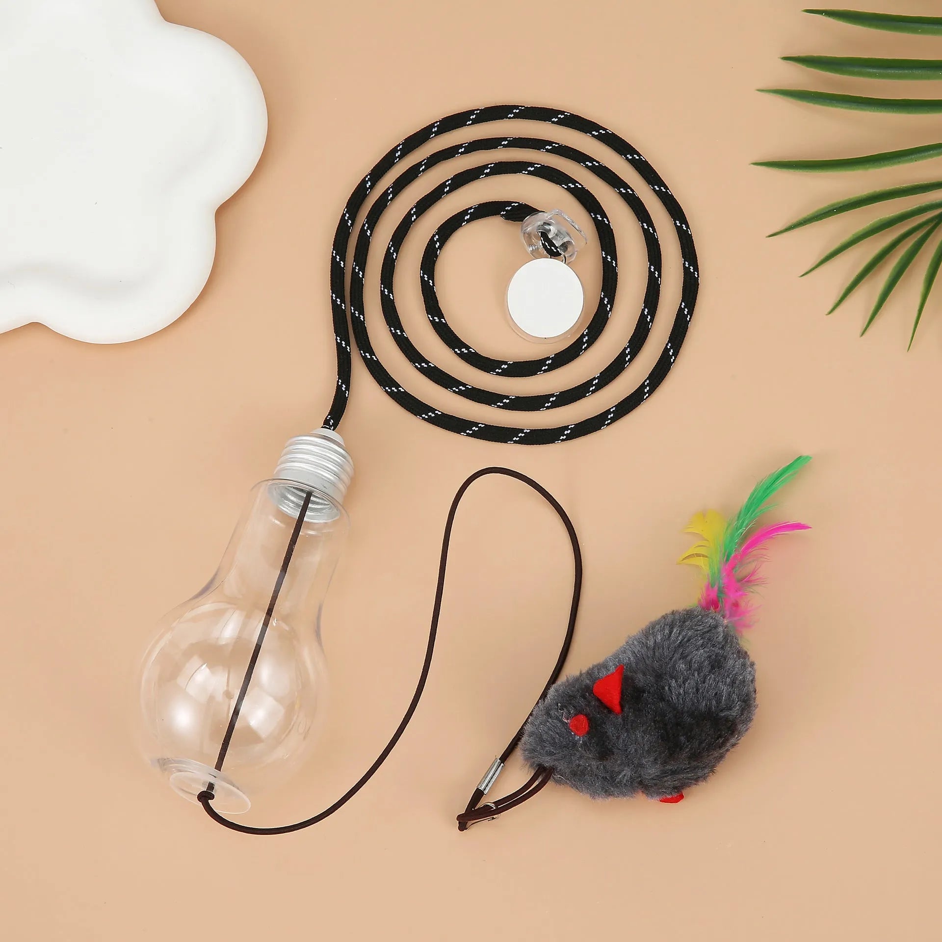 Interactive cat toy with elastic cord, dangling mouse and chicken toys, and treat dispenser bulb