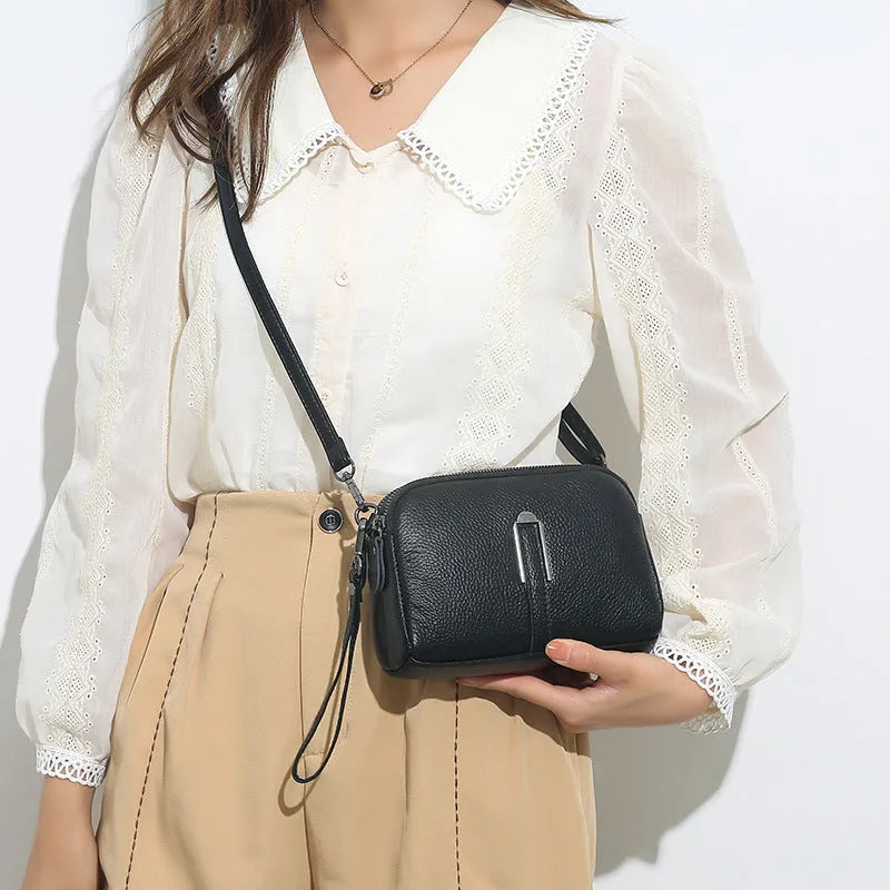 Genuine leather women's shoulder bag in horizontal square shape, shown in one of five colour options.