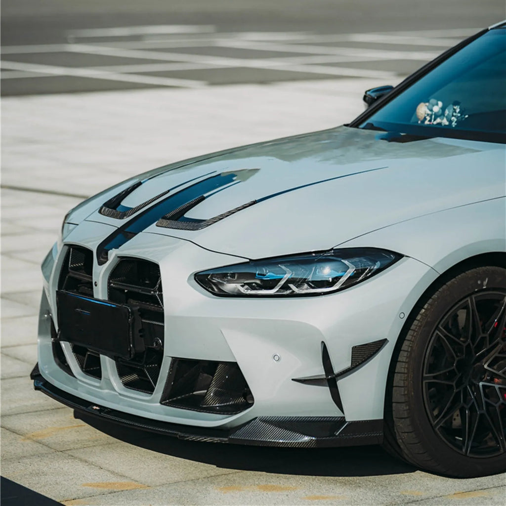 Dry carbon fibre front bumper grille for BMW M3 M4 G80 G82 models in black with 3K weave.