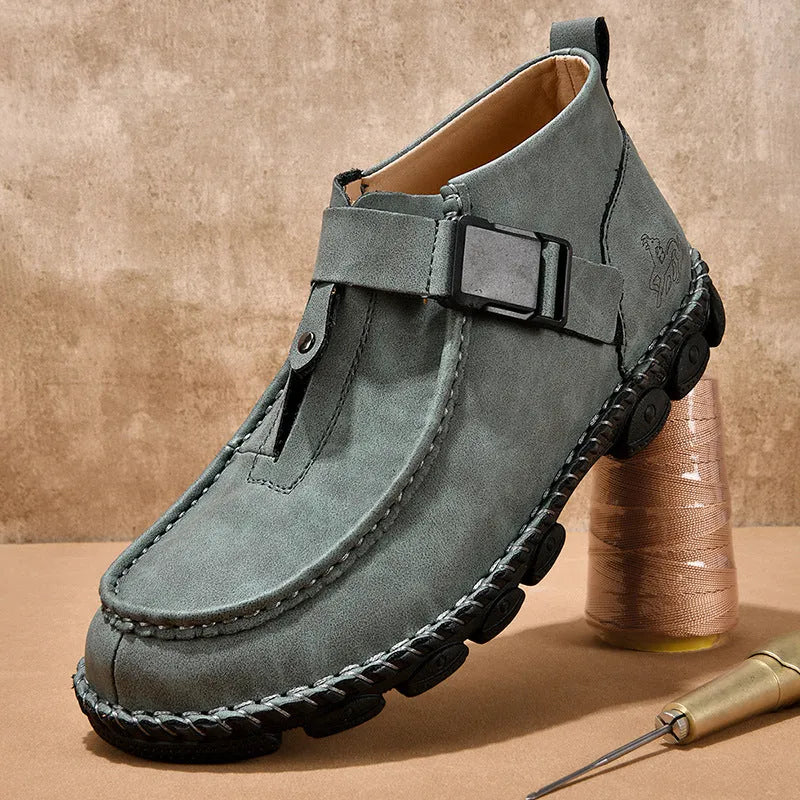 Handmade brown PU leather slip-on casual shoes with flat heel on a white background.