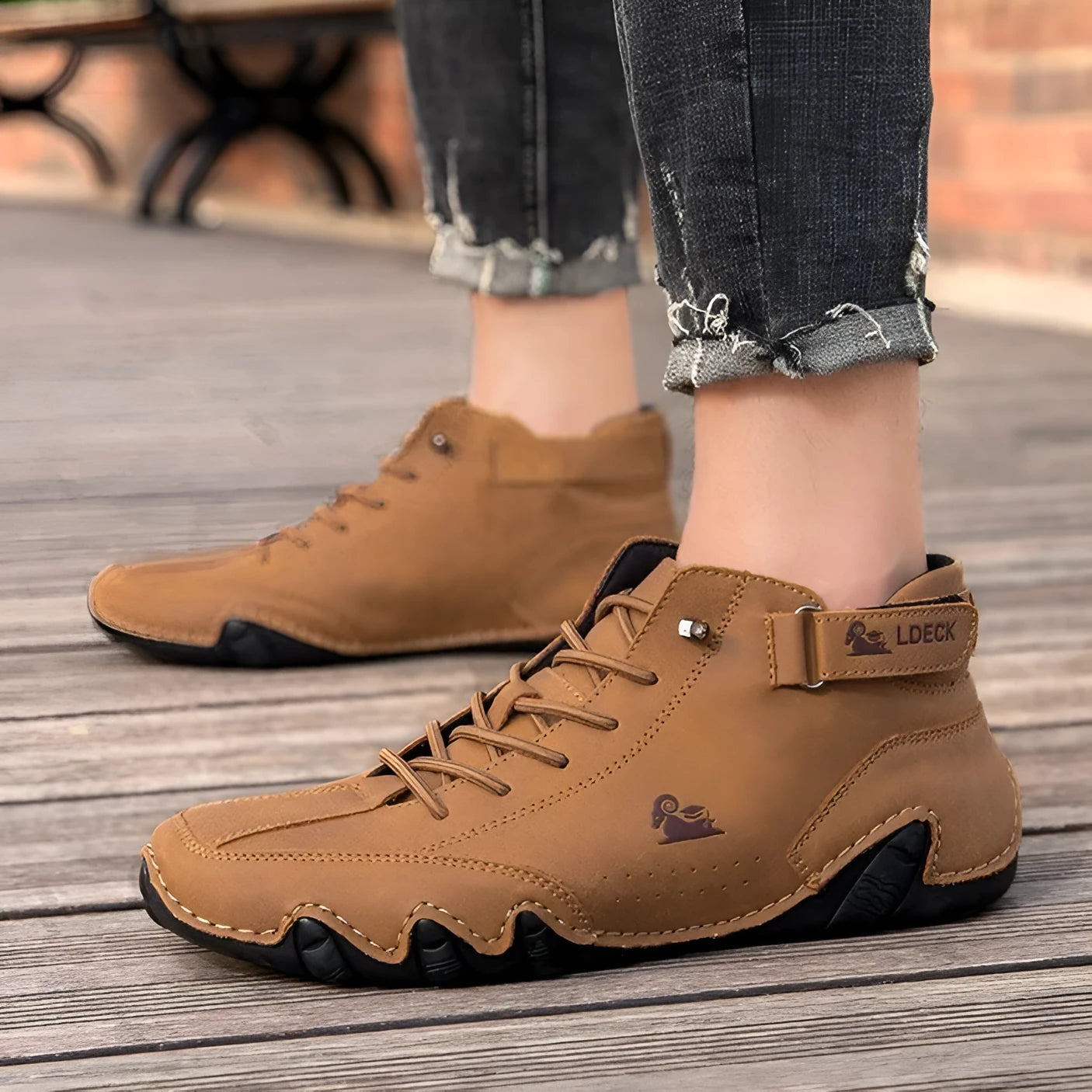 Men's khaki high top Octopus shoes with a round toe and rubber sole on a neutral background.