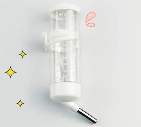 Green plastic ball kettle water feeder for small pets attached to a wire cage.