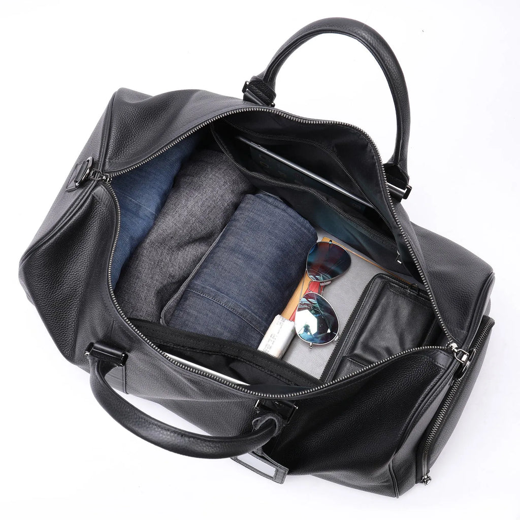 Men's black leather excursion bag with single strap showing 44cm length
