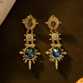 Gold geometric round stud earrings with diamond treatment surface