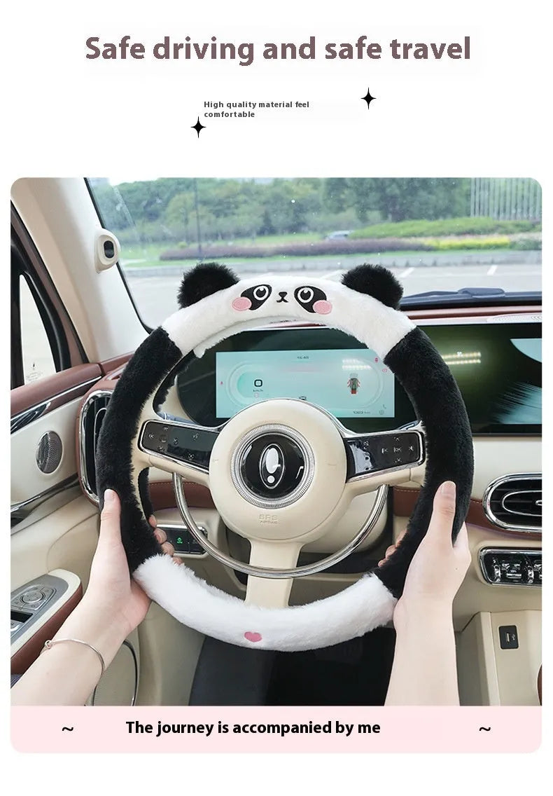 Plush winter steering wheel cover with cartoon embroidery, shown in 38cm size on a car steering wheel.